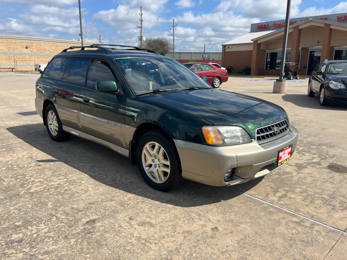 2003 green /TAN Subaru Outback Limited Wagon (4S3BH686737) with an 2.5L H4 SOHC 16V engine, 5-Speed Manual Overdrive transmission, located at 14700 Tomball Parkway 249, Houston, TX, 77086, (281) 444-2200, 29.928619, -95.504074 - Photo#0